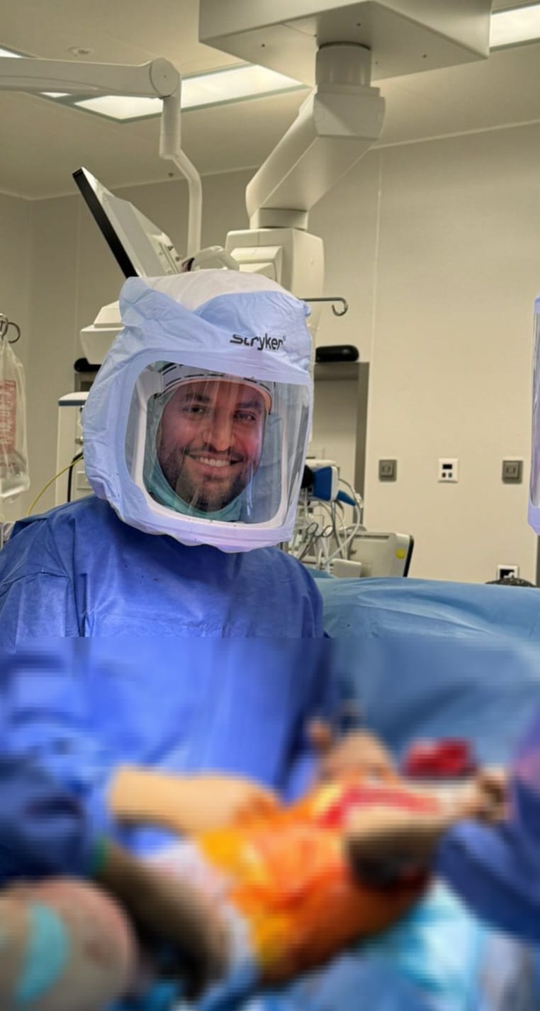Dr. Artinopoulos during surgery